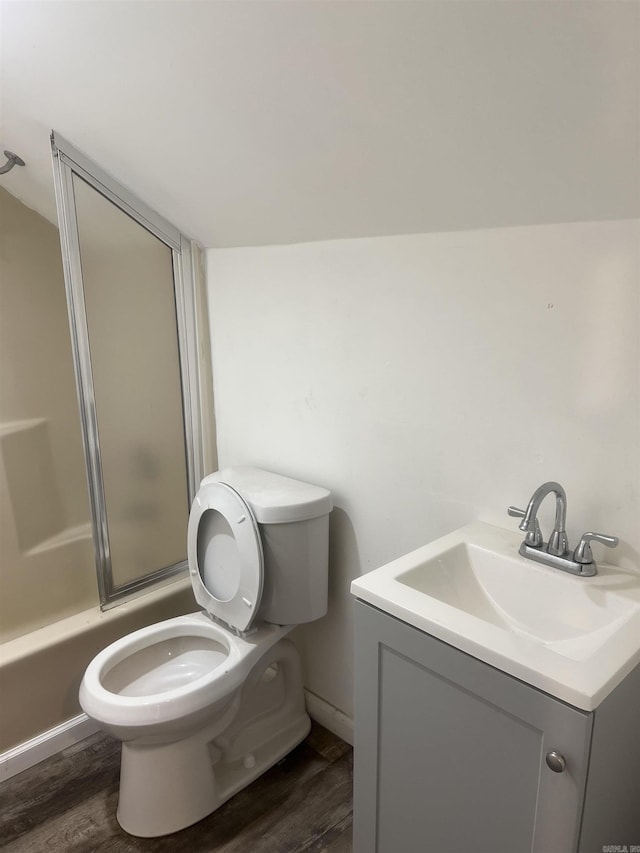 1203 Stewart Rd, Little Rock, AR 72223 - full bath featuring wood finished floors, toilet, vanity, and bathtub / shower combination