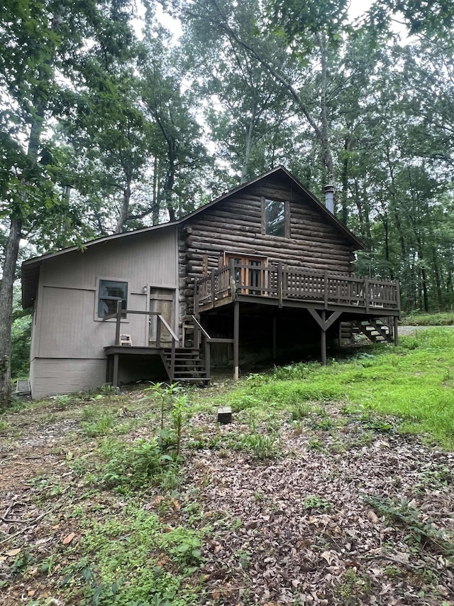 1203 Stewart Rd, Little Rock, AR 72223 - back of house with a wooden deck, stairs, and log exterior