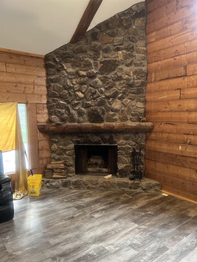 1203 Stewart Rd, Little Rock, AR 72223 - unfurnished living room featuring a fireplace, wood finished floors, and wooden walls