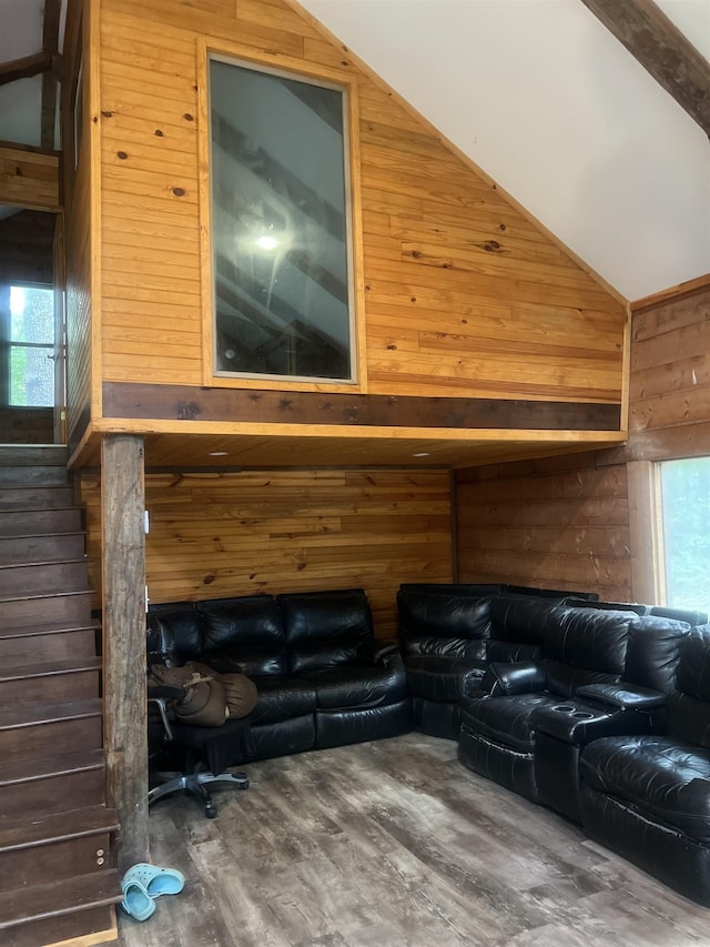 1203 Stewart Rd, Little Rock, AR 72223 - living room with wood walls, wood finished floors, and lofted ceiling