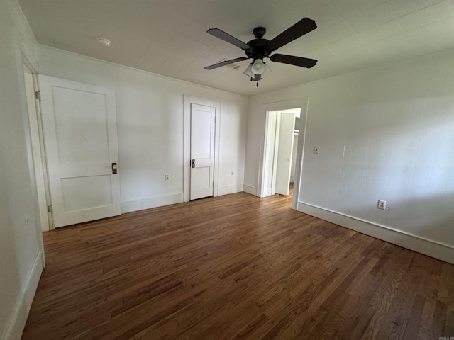 404 Mchenry, Malvern, AR 72104 - unfurnished bedroom featuring wood finished floors, baseboards, and a ceiling fan