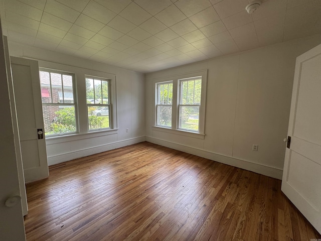 404 Mchenry, Malvern, AR 72104 - spare room with wood finished floors and baseboards