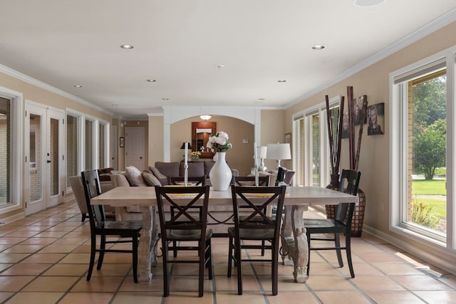 13 Heritage Park Cir, North Little Rock, AR 72116 - dining space featuring light tile patterned flooring, ornamental molding, french doors, arched walkways, and recessed lighting
