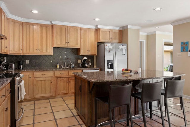 13 Heritage Park Cir, North Little Rock, AR 72116 - kitchen with stainless steel appliances, a sink, light tile patterned floors, backsplash, and recessed lighting