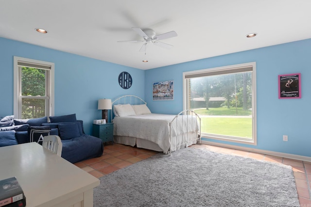 13 Heritage Park Cir, North Little Rock, AR 72116 - tiled bedroom with multiple windows, recessed lighting, and a ceiling fan