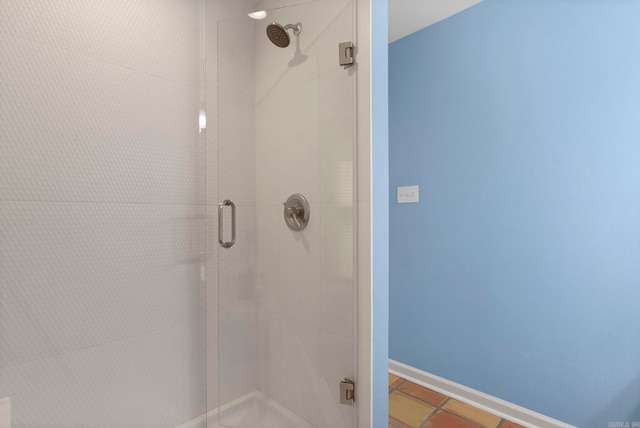 13 Heritage Park Cir, North Little Rock, AR 72116 - bathroom with a shower stall, baseboards, and tile patterned floors