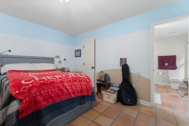 13 Heritage Park Cir, North Little Rock, AR 72116 - bedroom with tile patterned flooring and baseboards