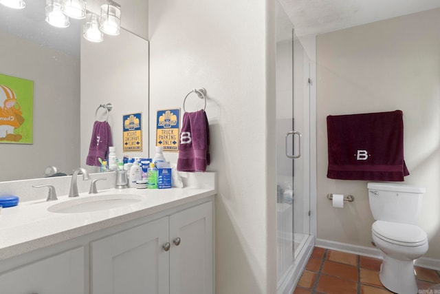 13 Heritage Park Cir, North Little Rock, AR 72116 - bathroom featuring vanity, a shower stall, toilet, tile patterned floors, and baseboards