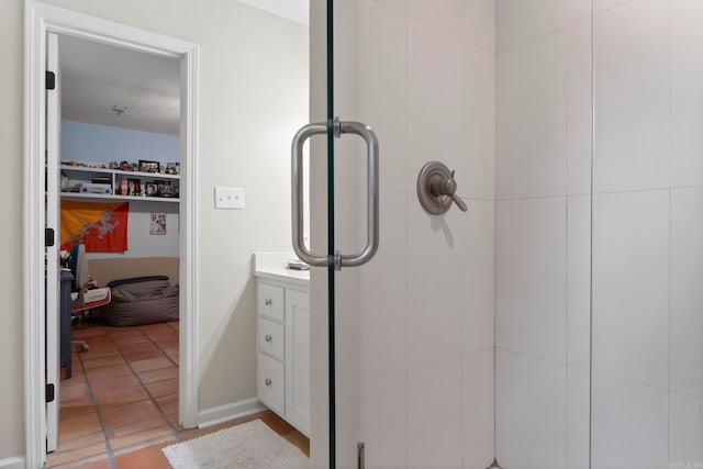 13 Heritage Park Cir, North Little Rock, AR 72116 - bathroom featuring a stall shower, vanity, and tile patterned flooring