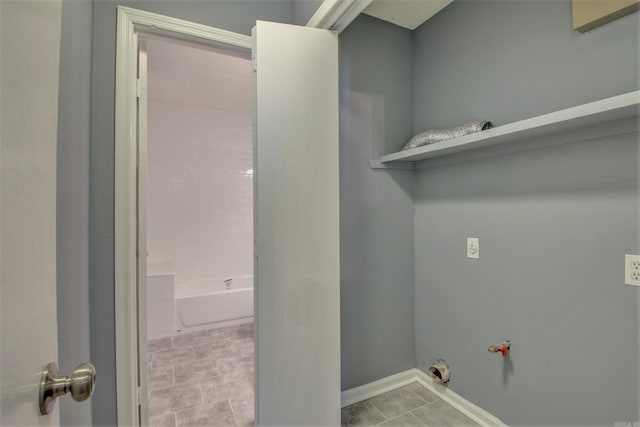 1320 Abigail St, Little Rock, AR 72204 - washroom featuring tile patterned floors and baseboards