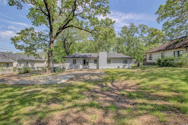 1320 Abigail St, Little Rock, AR 72204 - back of property featuring a chimney