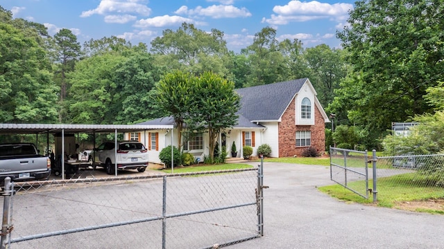 15621 Mail Route Rd, Little Rock, AR 72206 - view of front of property with asphalt driveway, brick siding, and a shingled roof