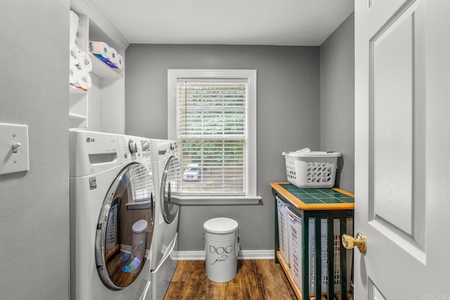 15621 Mail Route Rd, Little Rock, AR 72206 - laundry area with washer and clothes dryer, wood finished floors, and baseboards