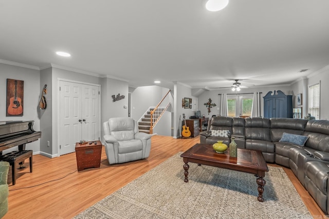 15621 Mail Route Rd, Little Rock, AR 72206 - living area featuring stairway, ceiling fan, light wood-style floors, crown molding, and recessed lighting