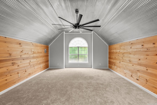 15621 Mail Route Rd, Little Rock, AR 72206 - bonus room featuring lofted ceiling, a ceiling fan, wood walls, carpet, and baseboards