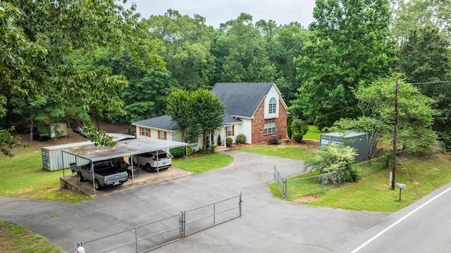 15621 Mail Route Rd, Little Rock, AR 72206 - view of front of house featuring driveway, a gate, and a carport