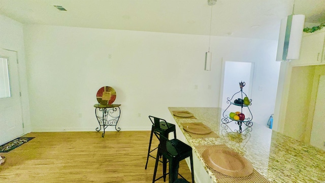 1418 S Martin St, Little Rock, AR 72204 - dining area featuring light wood finished floors and baseboards