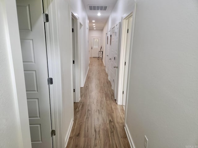 1418 S Martin St, Little Rock, AR 72204 - hallway featuring light wood-type flooring, baseboards, and recessed lighting