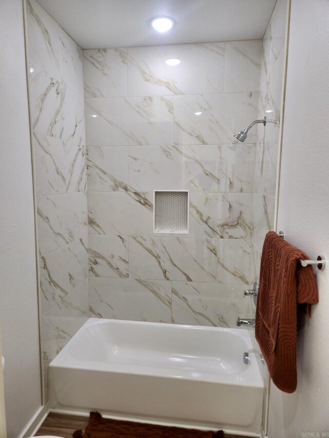 1418 S Martin St, Little Rock, AR 72204 - full bathroom featuring shower / tub combination and wood finished floors