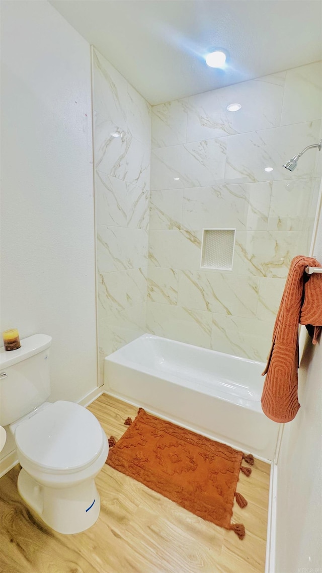 1418 S Martin St, Little Rock, AR 72204 - full bathroom featuring toilet, wood finished floors, and  shower combination