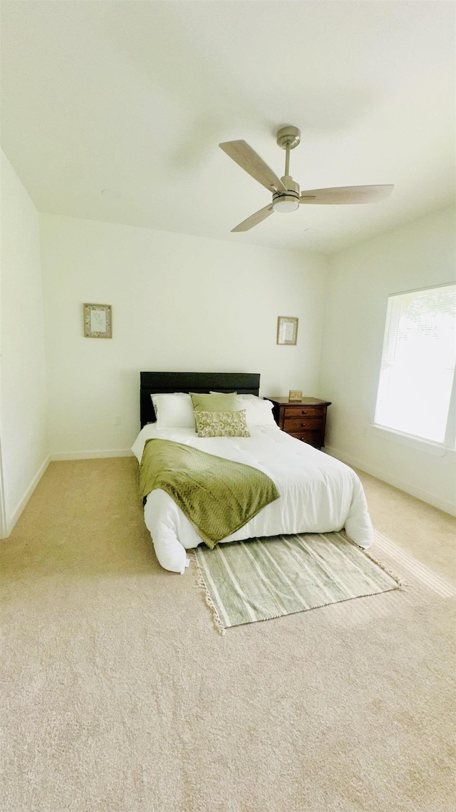 1418 S Martin St, Little Rock, AR 72204 - bedroom featuring light colored carpet, a ceiling fan, and baseboards