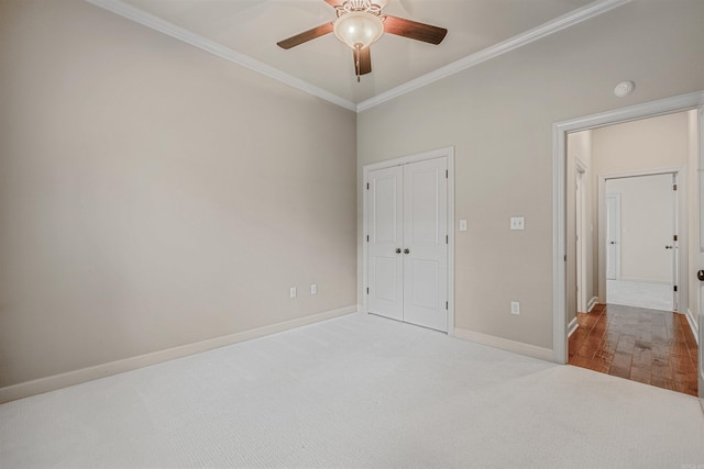 26 Kanis Creek Pl, Little Rock, AR 72223 - unfurnished bedroom featuring ornamental molding, baseboards, carpet floors, a closet, and a ceiling fan