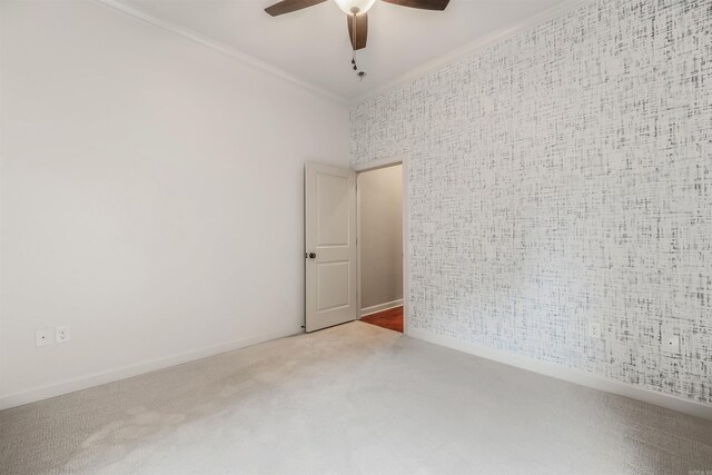26 Kanis Creek Pl, Little Rock, AR 72223 - spare room featuring crown molding, ceiling fan, carpet floors, and baseboards