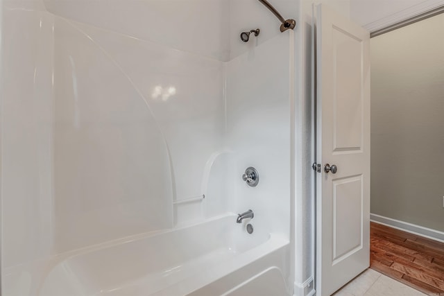 26 Kanis Creek Pl, Little Rock, AR 72223 - full bath featuring washtub / shower combination, baseboards, and tile patterned flooring