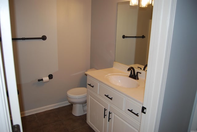 148 Peach St, Austin, AR 72007 - bathroom featuring toilet, vanity, tile patterned floors, and baseboards