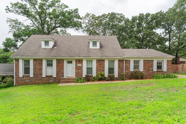 3017 Delmar Ave, North Little Rock, AR 72116 - new england style home with roof with shingles, brick siding, and entry steps