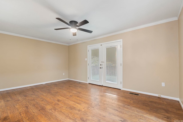 3017 Delmar Ave, North Little Rock, AR 72116 - empty room with french doors, crown molding, a ceiling fan, baseboards, and wood finished floors