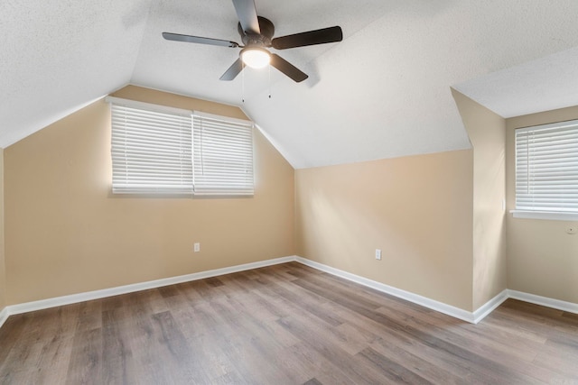 3017 Delmar Ave, North Little Rock, AR 72116 - bonus room featuring ceiling fan, wood finished floors, lofted ceiling, baseboards, and a textured ceiling