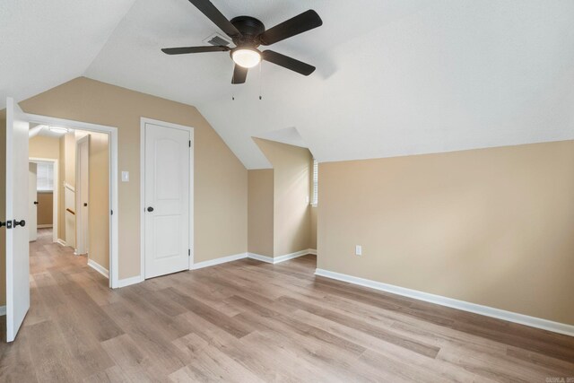 3017 Delmar Ave, North Little Rock, AR 72116 - additional living space with light wood-type flooring, vaulted ceiling, a ceiling fan, and baseboards