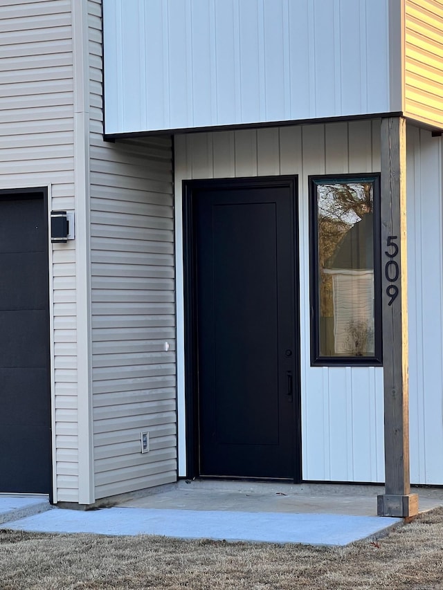 509 Algood St, Benton, AR 72015 - property entrance with a garage