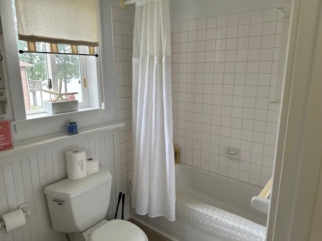 1803 Fairwater Cir, Horseshoe Bend, AR 72512 - bathroom with toilet and shower / bath combo
