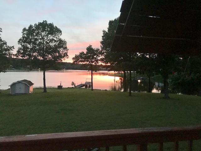 1803 Fairwater Cir, Horseshoe Bend, AR 72512 - view of green lawn with a water view