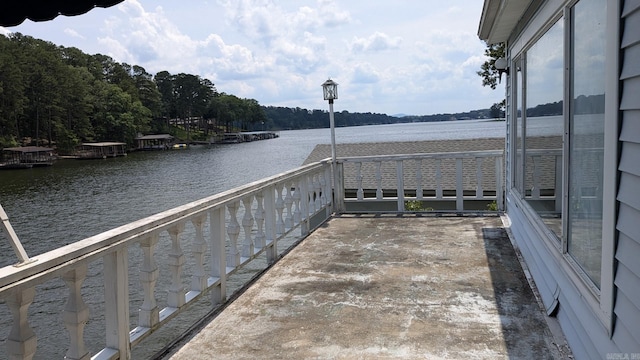 balcony featuring a water view