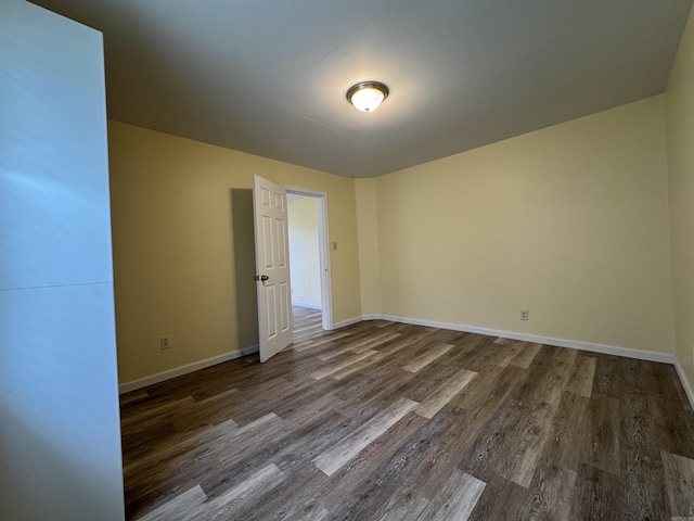 1316-1318 W 13th St, Little Rock, AR 72202 - unfurnished room with dark wood-style flooring and baseboards