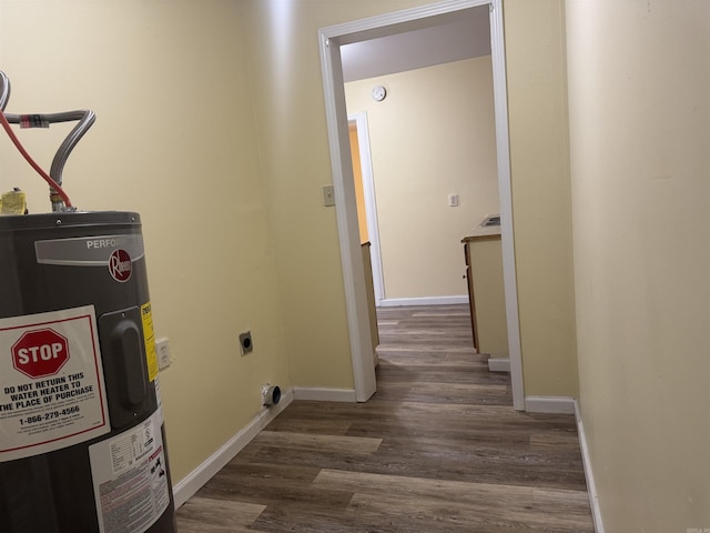1316-1318 W 13th St, Little Rock, AR 72202 - washroom featuring electric water heater, wood finished floors, electric dryer hookup, and baseboards