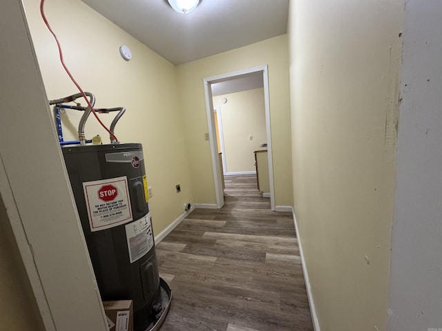1316-1318 W 13th St, Little Rock, AR 72202 - corridor with wood finished floors, water heater, and baseboards