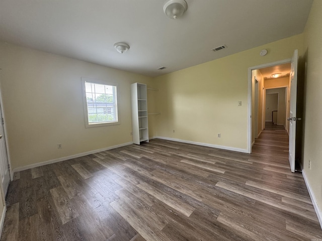 1316-1318 W 13th St, Little Rock, AR 72202 - spare room featuring dark wood finished floors, baseboards, and a smoke detector