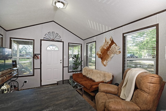 193 Sycamore, Sheridan, AR 72150 - entrance foyer with vaulted ceiling, crown molding, and a textured ceiling