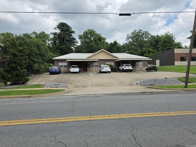 1615 Aldersgate Rd, Little Rock, AR 72205 - view of front of home featuring brick siding and uncovered parking