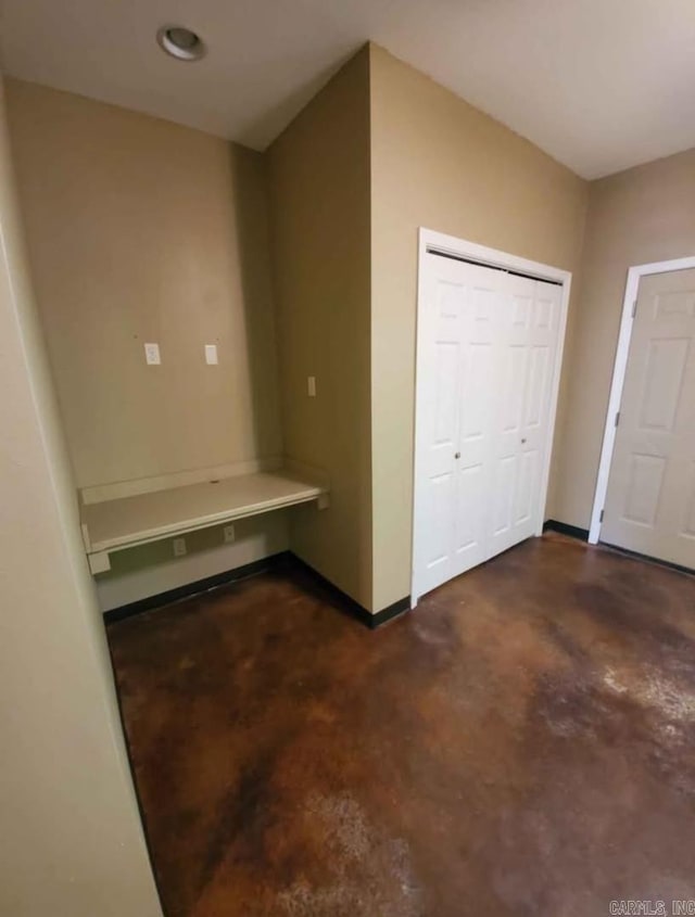 1615 Aldersgate Rd, Little Rock, AR 72205 - corridor with finished concrete flooring and baseboards