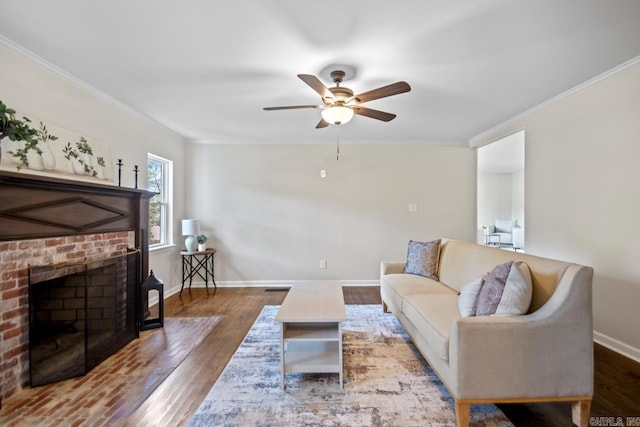 104 Dickson Dr, Little Rock, AR 72207 - living room with a ceiling fan, crown molding, baseboards, a fireplace, and wood finished floors
