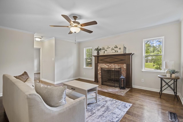 104 Dickson Dr, Little Rock, AR 72207 - living room with wood finished floors, a ceiling fan, crown molding, baseboards, and a fireplace