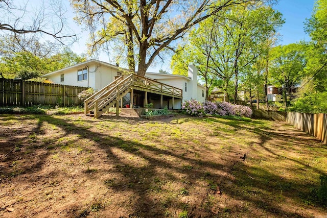 104 Dickson Dr, Little Rock, AR 72207 - fenced backyard with a deck and stairs