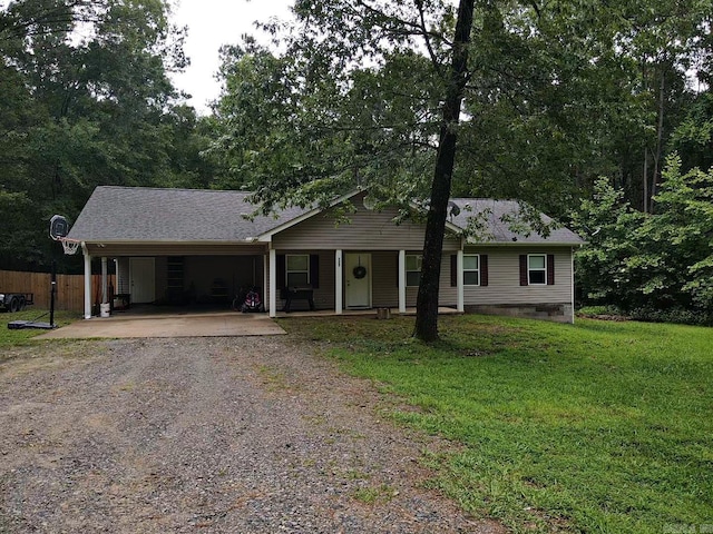 3537 W 26th Hwy, Arkadelphia, AR 71923 - ranch-style home featuring dirt driveway, an attached carport, covered porch, and a shingled roof