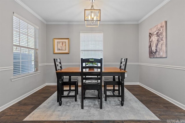 9 Westoak Cir, Little Rock, AR 72223 - dining space with dark wood-type flooring, plenty of natural light, a chandelier, crown molding, and baseboards