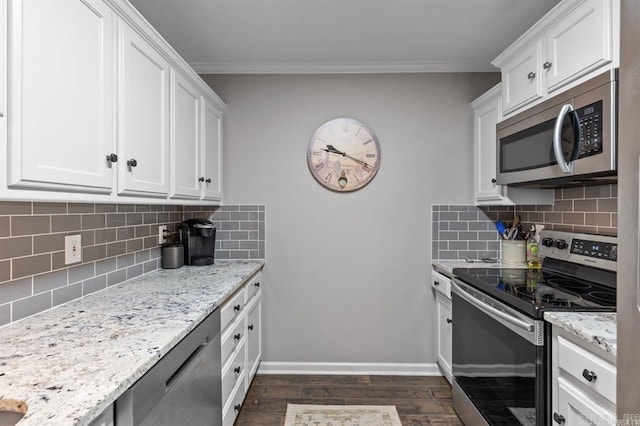 9 Westoak Cir, Little Rock, AR 72223 - kitchen featuring stainless steel appliances, dark wood-style floors, ornamental molding, tasteful backsplash, and white cabinets